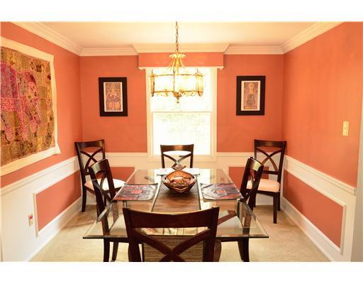 Dining Room. Crown molding, chair rail and raised panels create a distinctive dining room.