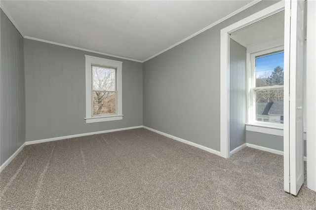 an empty room with windows