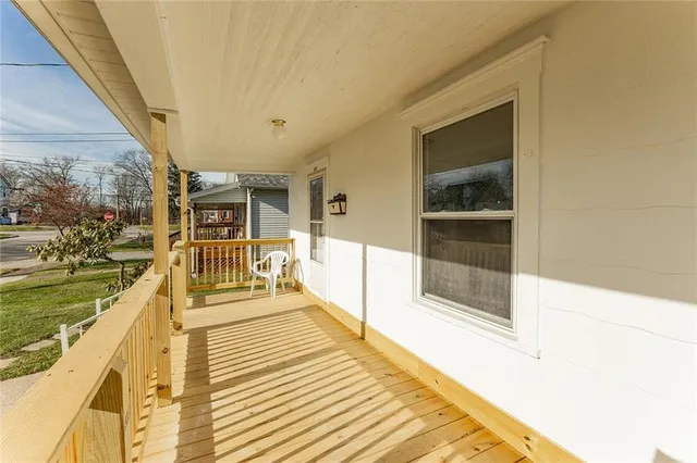 a view of a living room with a balcony