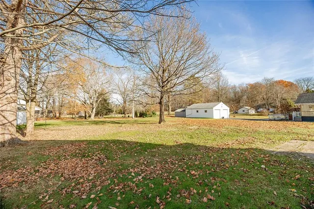 a view of an ocean with trees