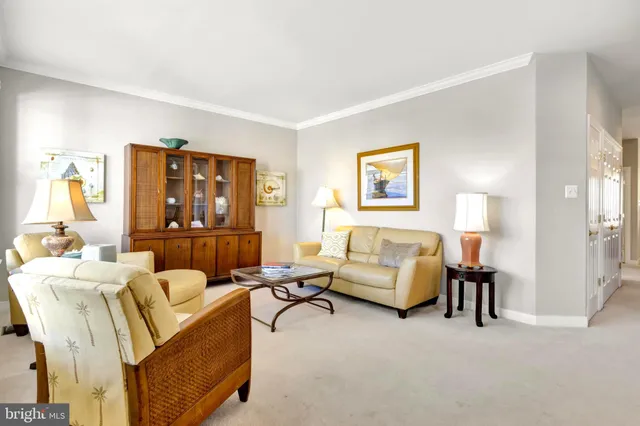 a large kitchen with stainless steel appliances granite countertop a refrigerator and a sink