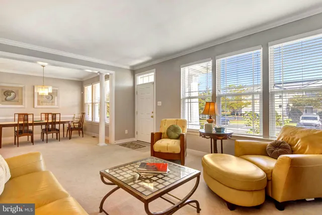 a kitchen with stainless steel appliances granite countertop a sink a stove and cabinets