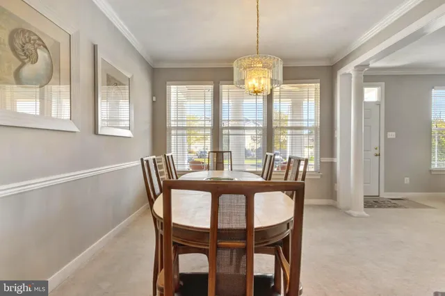 a bathroom with a sink a toilet and shower curtain