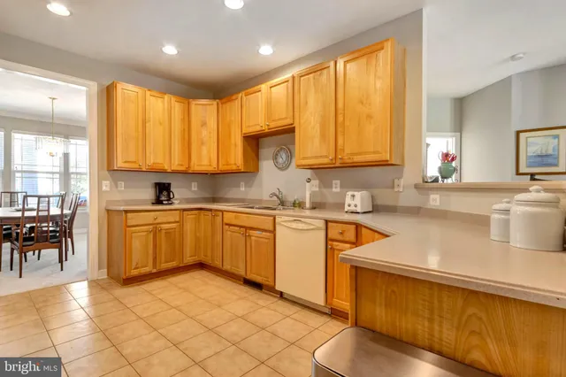a view of a chairs and table in the patio