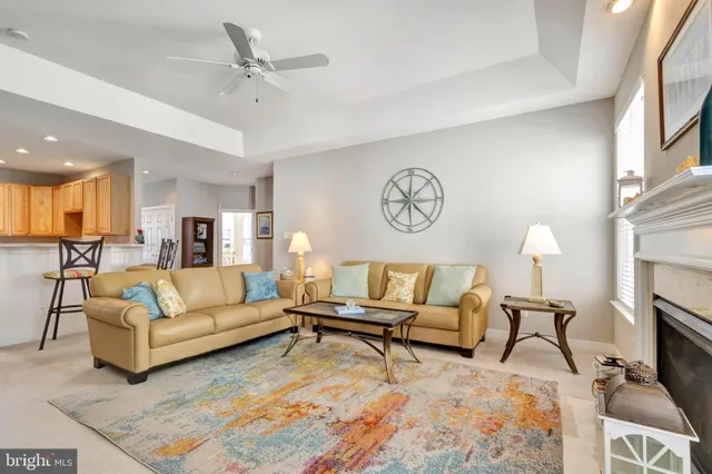 a bedroom with a bed and a large mirror