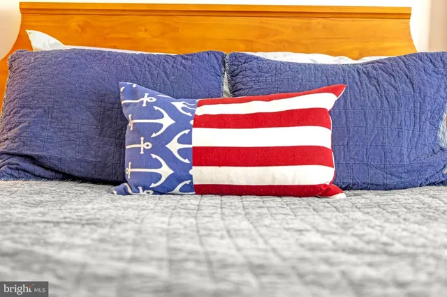 an aerial view of residential houses with city view