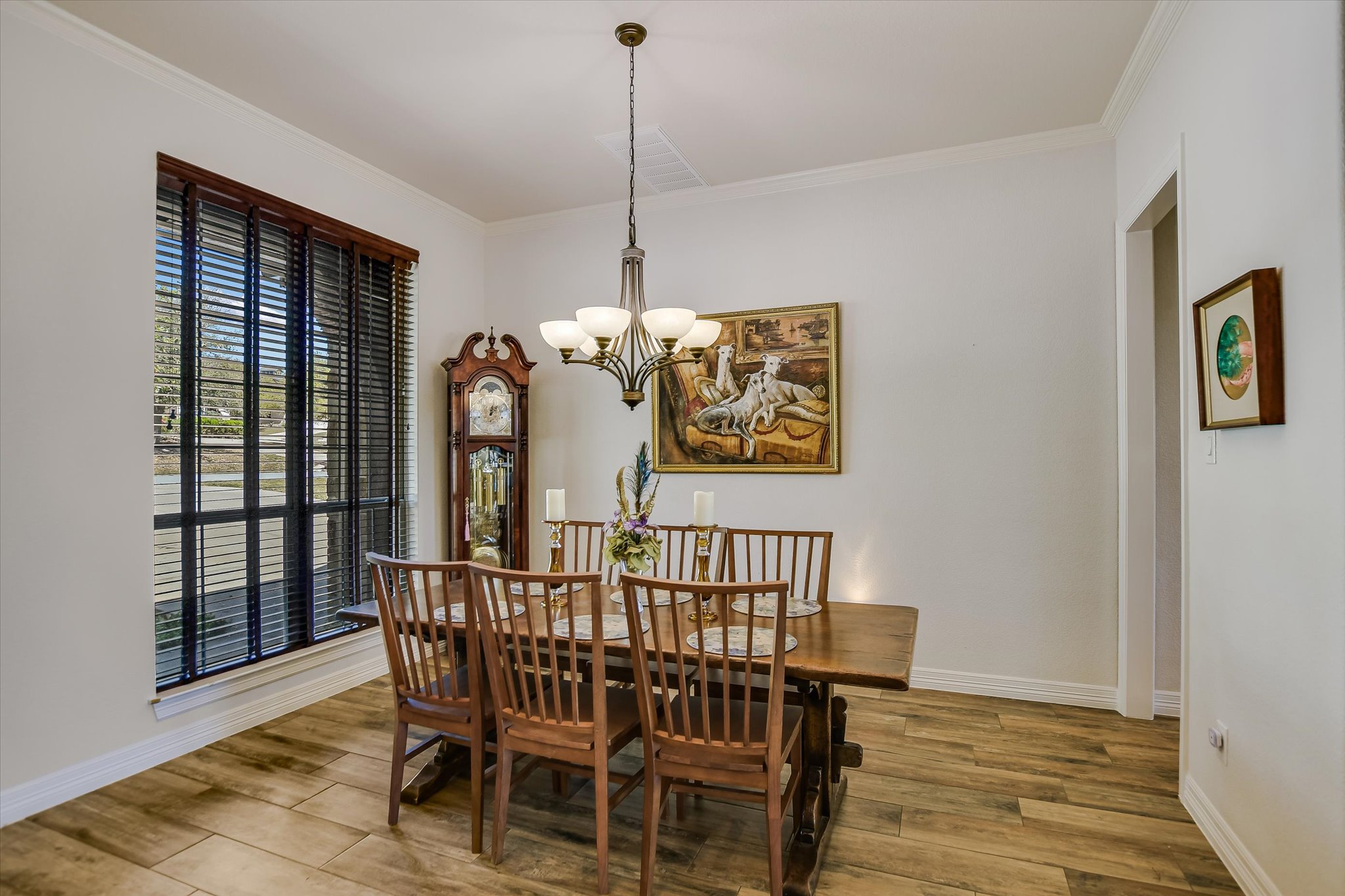 2404 First View Leander, TX 78641 - Photo 13 of 38 a view of a dining room with furniture window and wooden floor