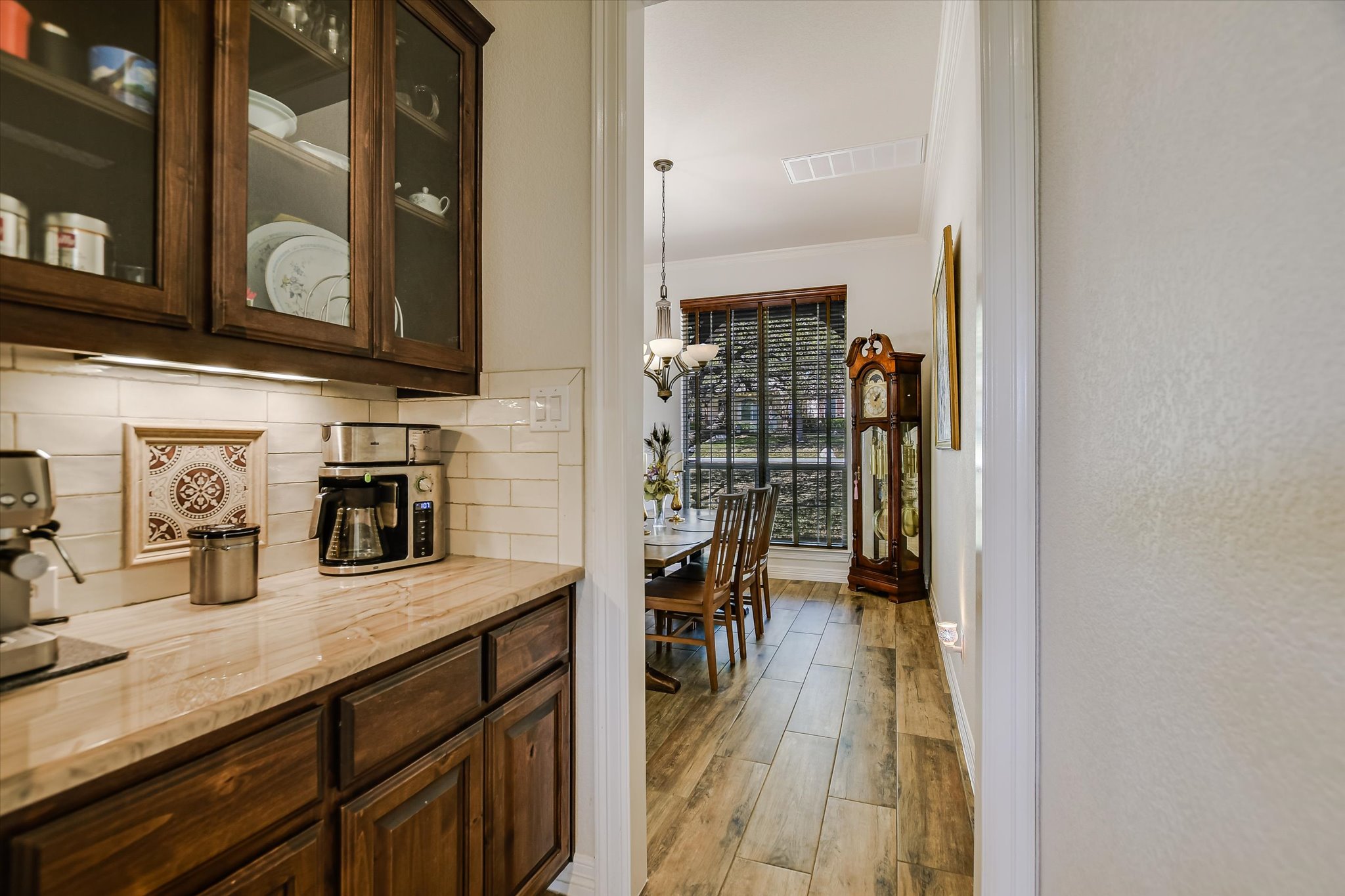 2404 First View Leander, TX 78641 - Photo 14 of 38 Butlers Pantry adds a Nice Touch of Sofistication and Eases the Utility of Serving Guests in a more Formal Manner.