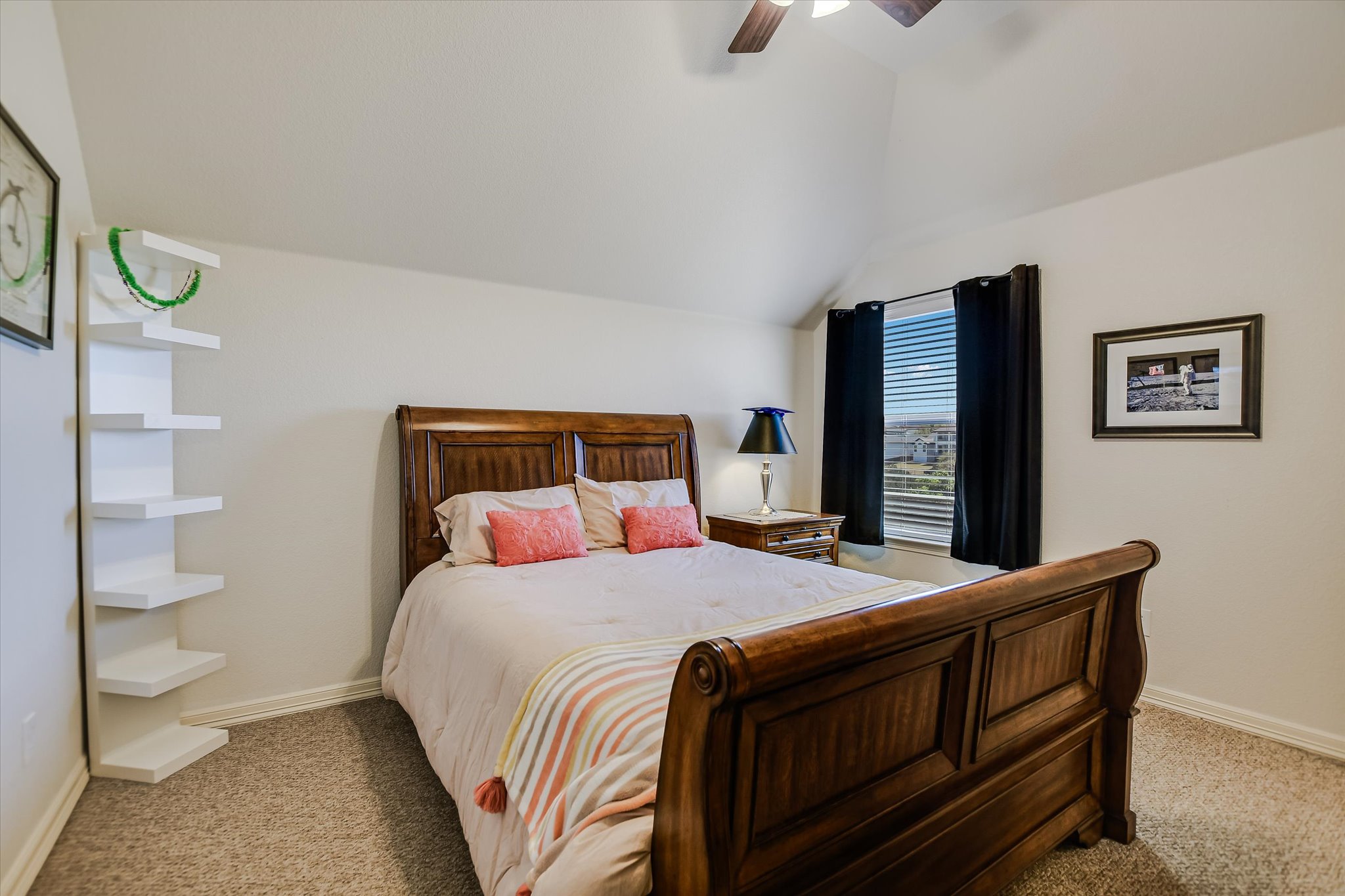 2404 First View Leander, TX 78641 - Photo 19 of 38 a bedroom with a bed and a lamp on dresser