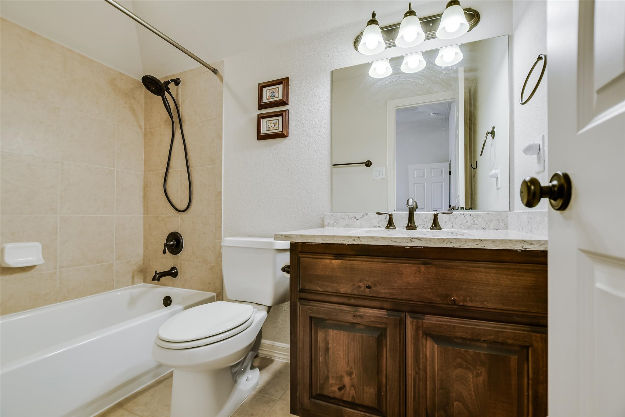 2404 First View Leander, TX 78641 - Photo 21 of 38 a bathroom with a sink a toilet and shower