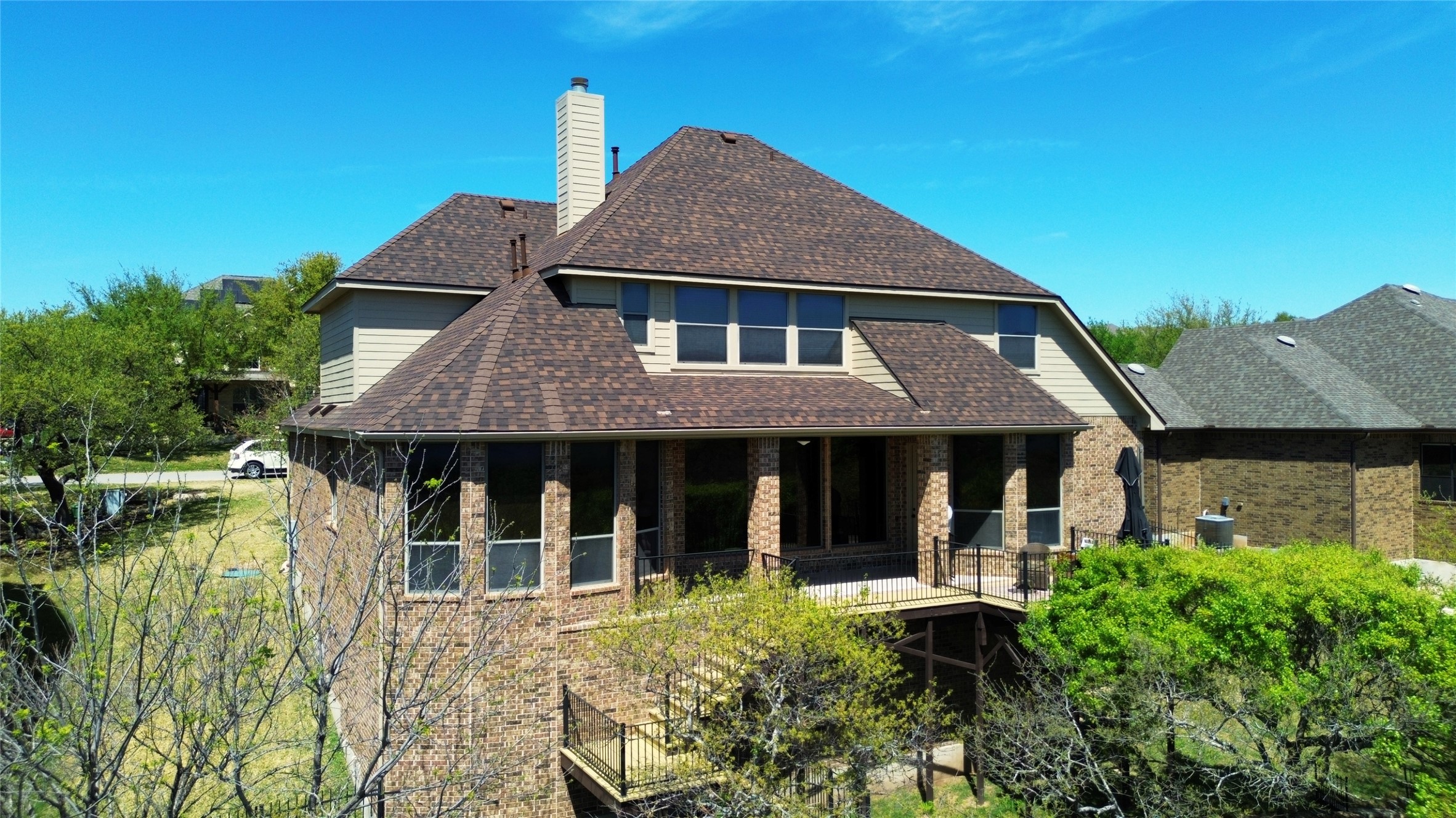 2404 First View Leander, TX 78641 - Photo 34 of 38 a front view of a house with a garden