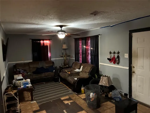 a view of a livingroom from a hallway