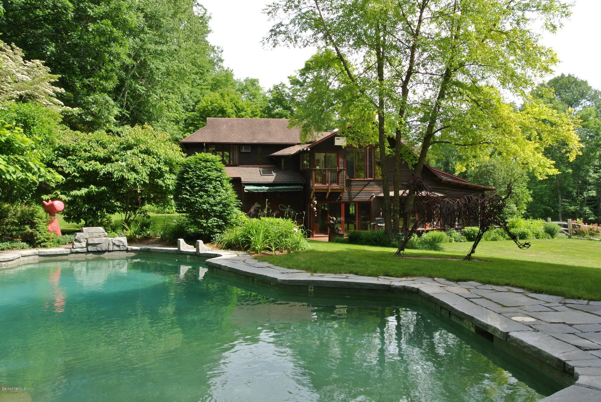 16 Averic Road Stockbridge, MA 01266 - Photo 1 of 24 a view of a house with a yard swimming pool and a lake view