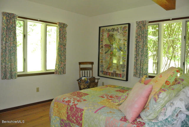 16 Averic Road Stockbridge, MA 01266 - Photo 15 of 24 a bedroom with a bed and a window