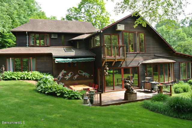 16 Averic Road Stockbridge, MA 01266 - Photo 20 of 24 a front view of a house with garden