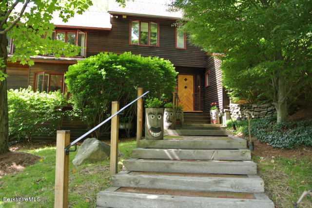 16 Averic Road Stockbridge, MA 01266 - Photo 24 of 24 a front view of a house with plants