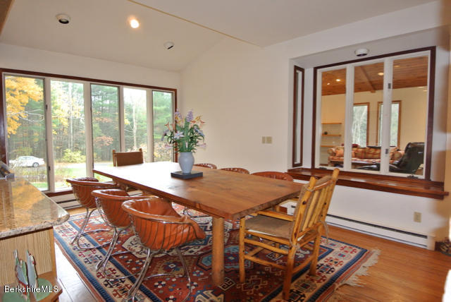 16 Averic Road Stockbridge, MA 01266 - Photo 6 of 24 a dining room with a table and chairs