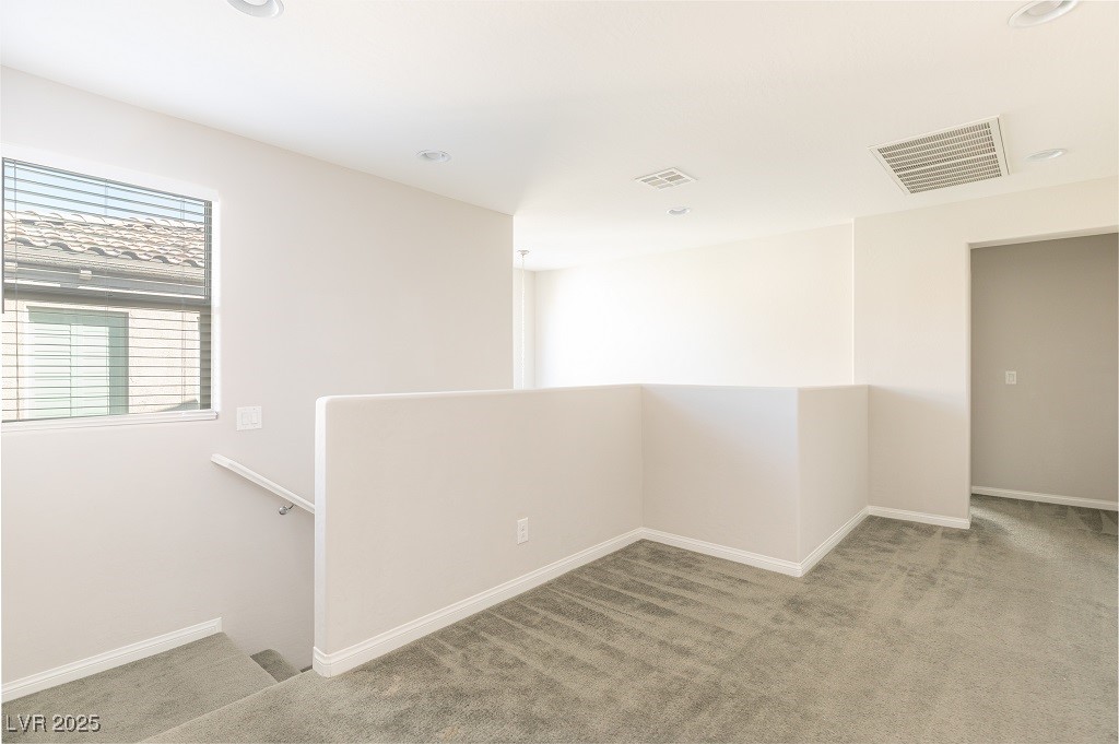 6856 Pivot Point Street Las Vegas, NV 89148 - Photo 20 of 32 Spare room featuring light carpet and recessed lighting