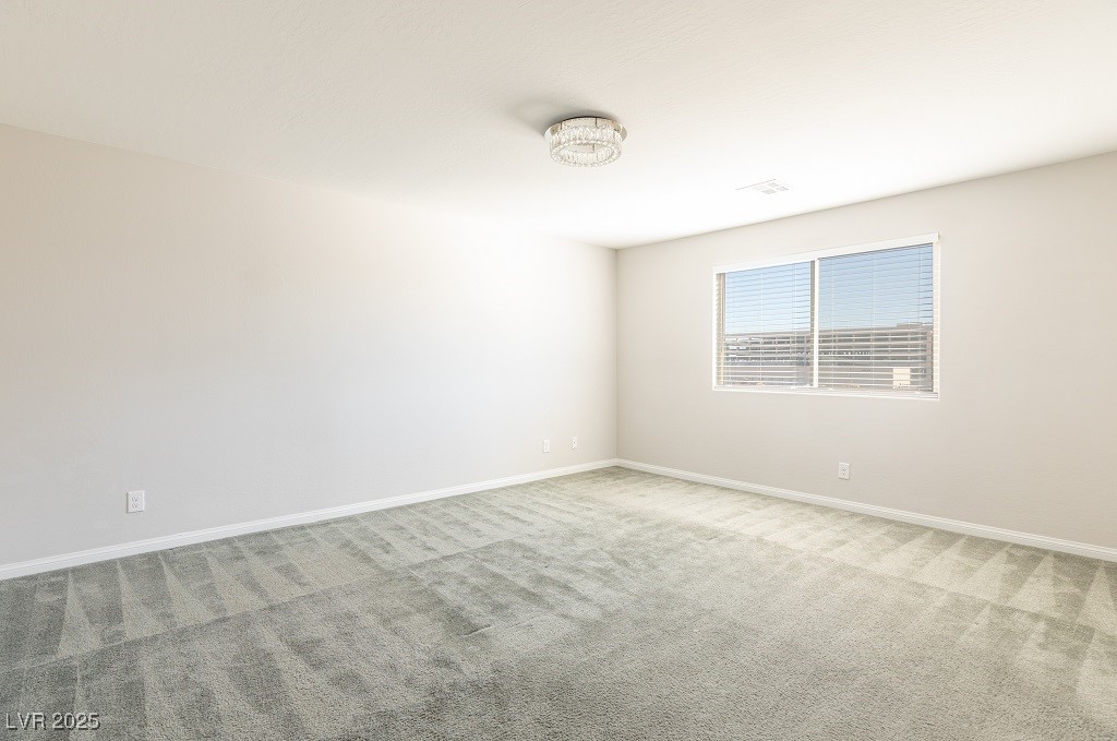 6856 Pivot Point Street Las Vegas, NV 89148 - Photo 21 of 32 Unfurnished room featuring carpet and baseboards