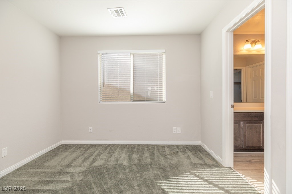 6856 Pivot Point Street Las Vegas, NV 89148 - Photo 26 of 32 Unfurnished room featuring light carpet