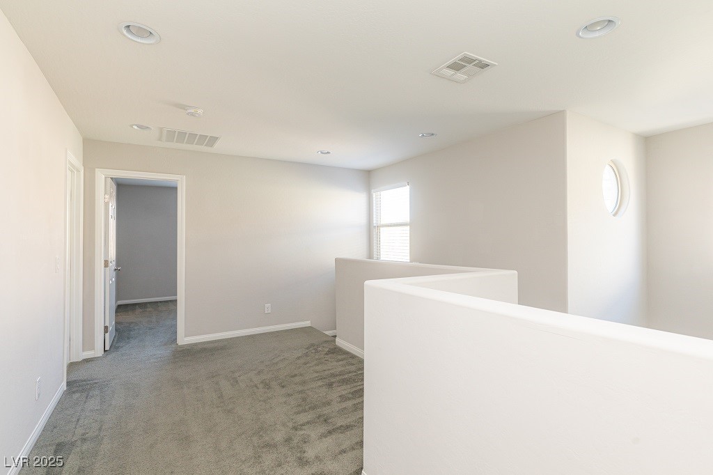 6856 Pivot Point Street Las Vegas, NV 89148 - Photo 32 of 32 Hallway featuring carpet, an upstairs landing, and recessed lighting