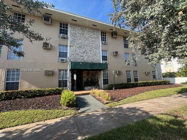 1400 Douglas Road, Unit 14 Coral Gables, FL 33134 - Photo 1 of 19 a view of a house with snow on the tree
