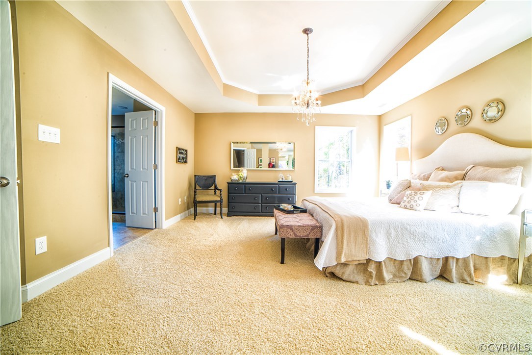 10819 Avening Road Chesterfield, VA 23832 - Photo 24 of 32 a bedroom with a bed and wooden floor