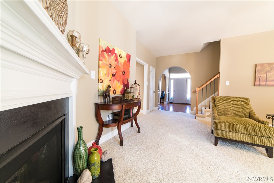 10819 Avening Road Chesterfield, VA 23832 - Photo 29 of 32 a living room with furniture and a fireplace