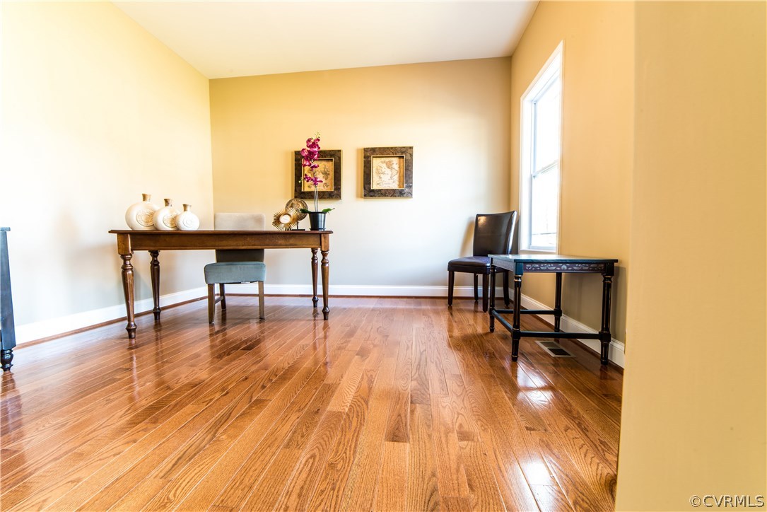 10819 Avening Road Chesterfield, VA 23832 - Photo 6 of 32 a workspace with furniture and wooden floor