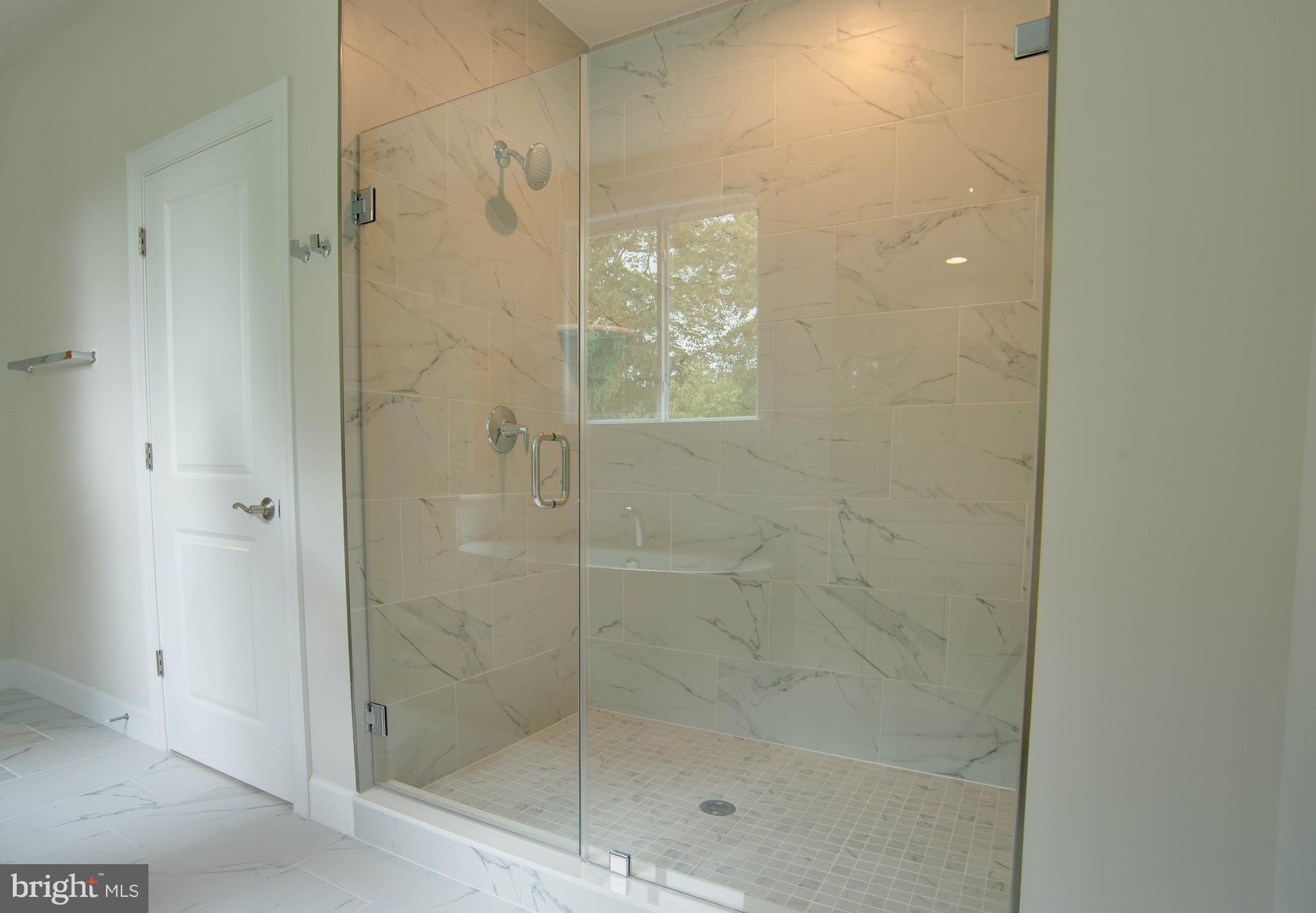 1419 Cottage Street Southwest Vienna, VA 22180 - Photo 20 of 34 a bathroom with a shower