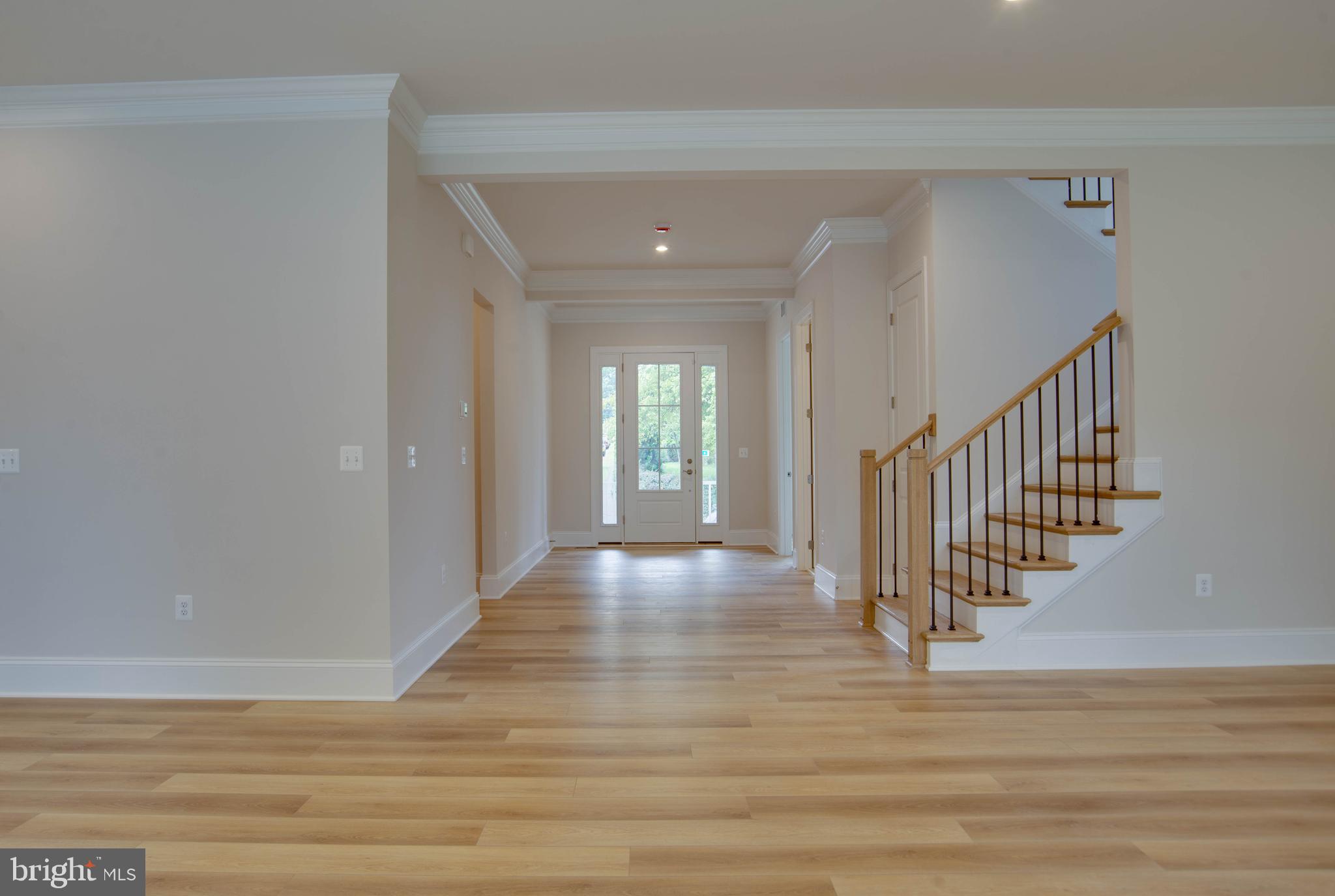 1419 Cottage Street Southwest Vienna, VA 22180 - Photo 7 of 34 a view of an entryway with wooden floor