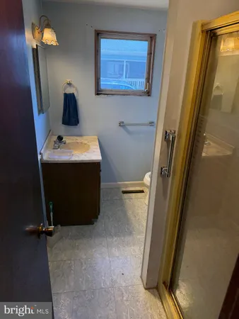 a room with a door and a table