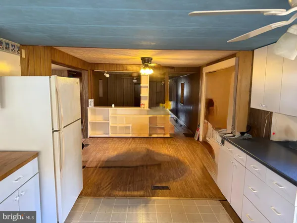 a bathroom with a tub and shower