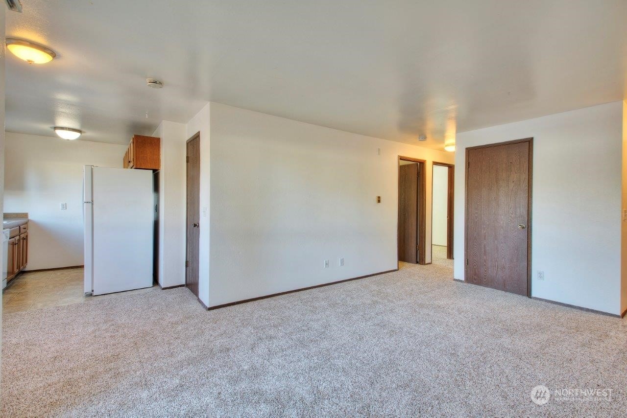440 Southwest 155th Street Burien, WA 98166 - Photo 3 of 22 a view of an empty room and a window