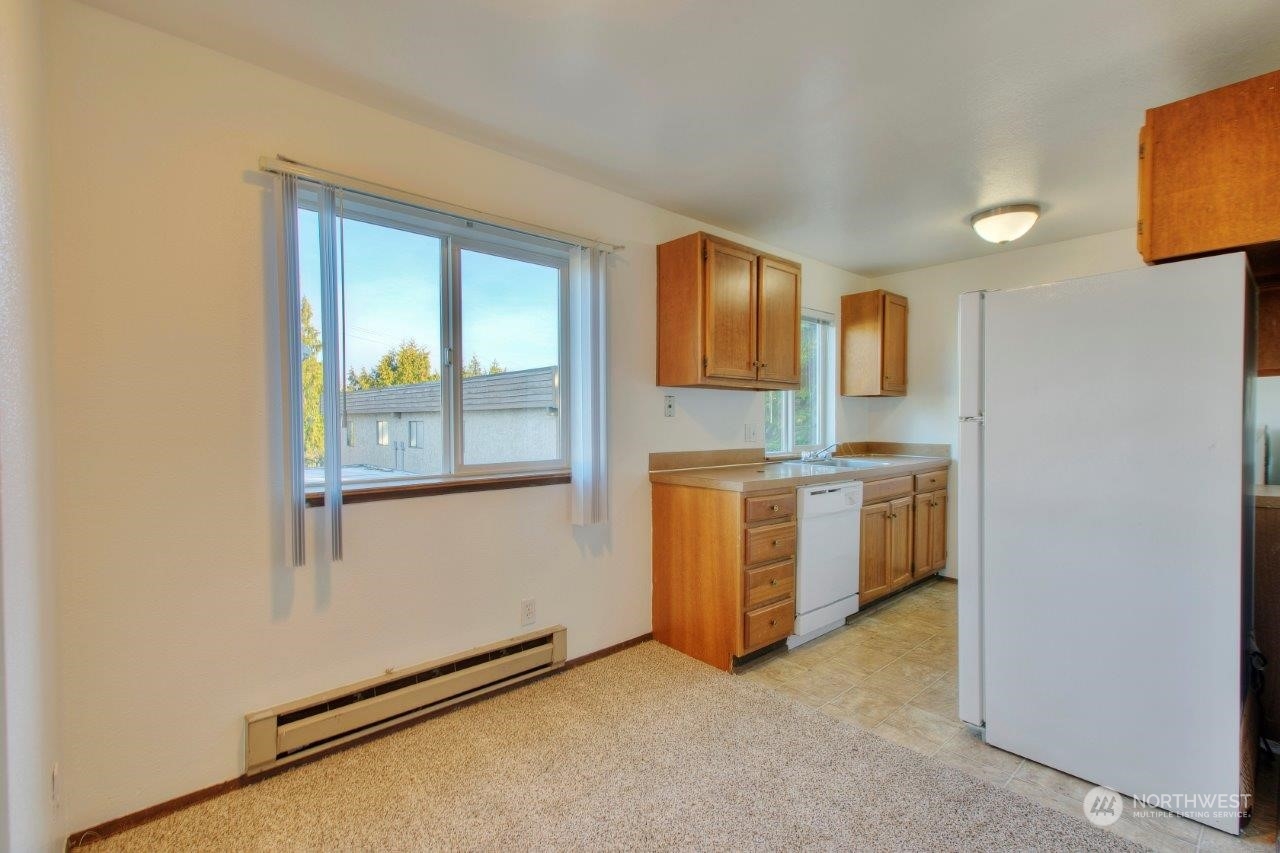 440 Southwest 155th Street Burien, WA 98166 - Photo 6 of 22 a view of kitchen and utility room