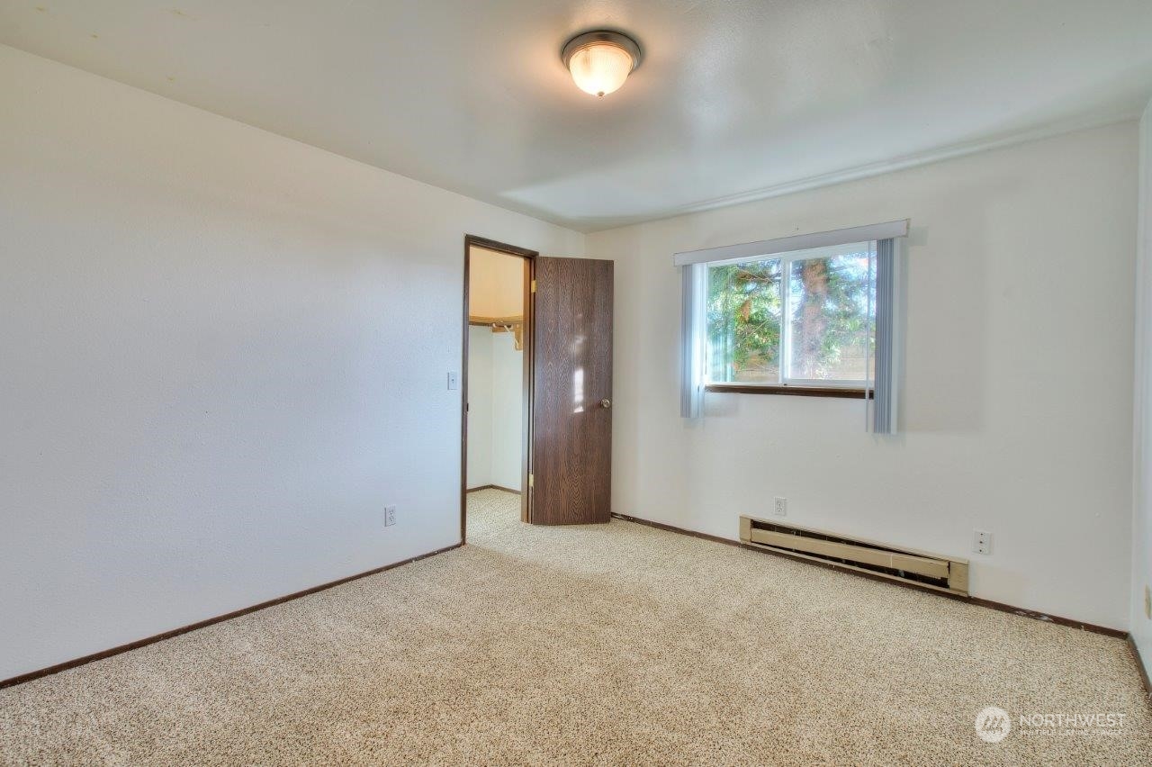 440 Southwest 155th Street Burien, WA 98166 - Photo 10 of 22 an empty room with windows