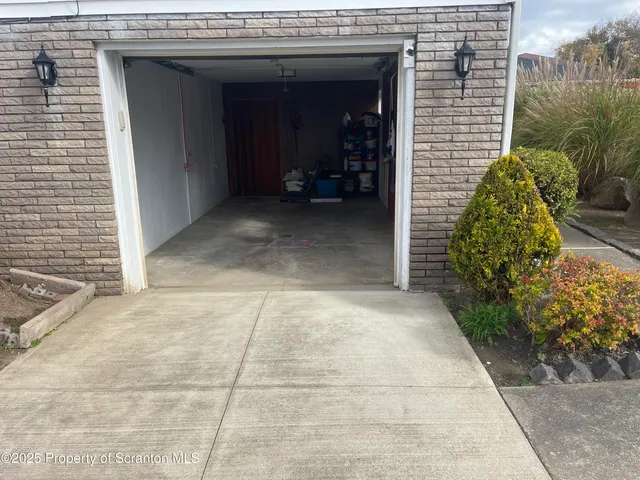 a view of a front door and a window