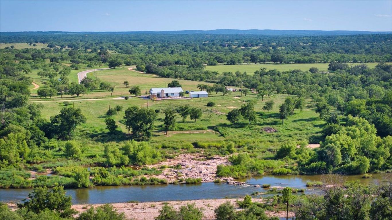 View of rural area featuring a heavily wooded area