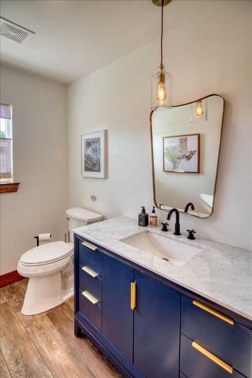 19811 West Ranch Road 152 Llano, TX 78643 - Photo 34 of 38 Bathroom with wood finished floors and vanity