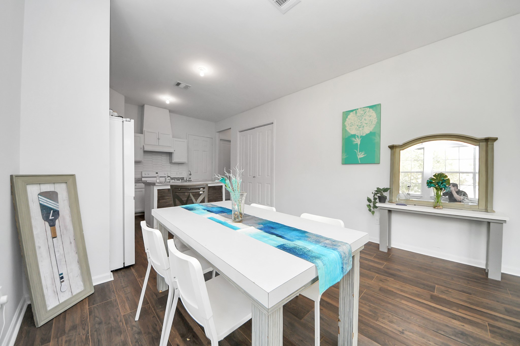 3011 Layne Street La Porte, TX 77571 - Photo 15 of 41 a view of a dining room with furniture and a wooden floor