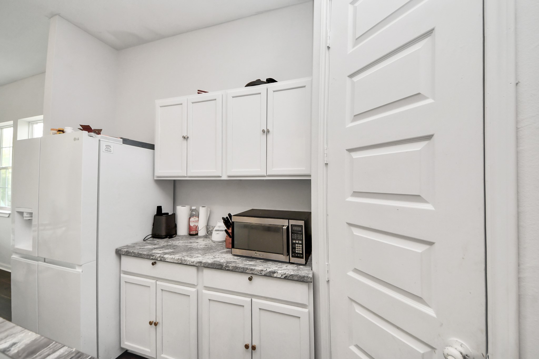 3011 Layne Street La Porte, TX 77571 - Photo 27 of 41 a kitchen with cabinets appliances and a sink