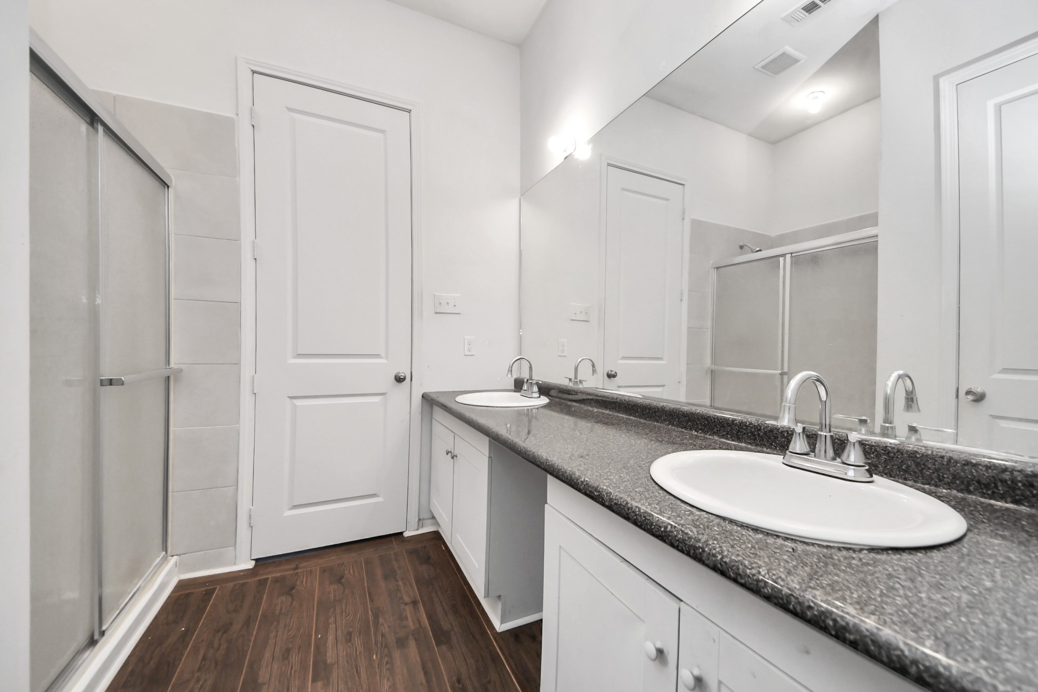 3011 Layne Street La Porte, TX 77571 - Photo 33 of 41 a bathroom with a granite countertop sink and a mirror