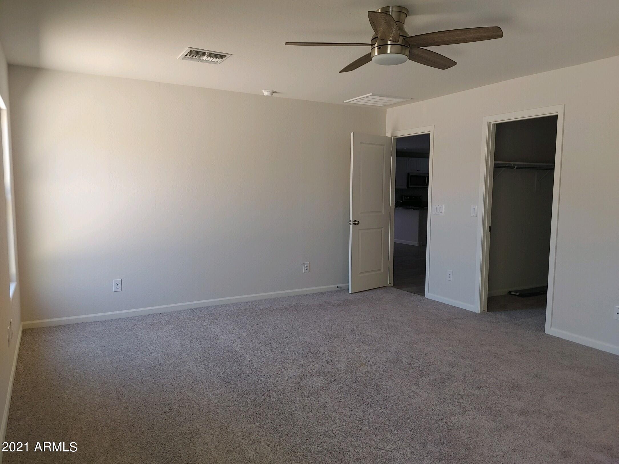 45196 West Sandhill Road Maricopa, AZ 85139 - Photo 11 of 20 Master Bedroom with walk in closet