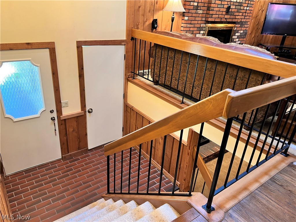35655 Timber Ridge Lane Willoughby, OH 44094 - Photo 3 of 32 Welcoming 2 story Foyer with brick tile flooring, wrought iron spindles.