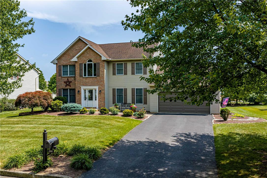 4568 Greenfield Road Bethlehem, PA 18017 - Photo 52 of 59 A classic brick and siding home welcomes you with a well-maintained lawn and mature landscaping.
