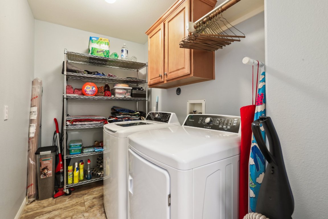 3805 Pebble Court Round Rock, TX 78664 - Photo 12 of 31 a utility room with dryer and washer