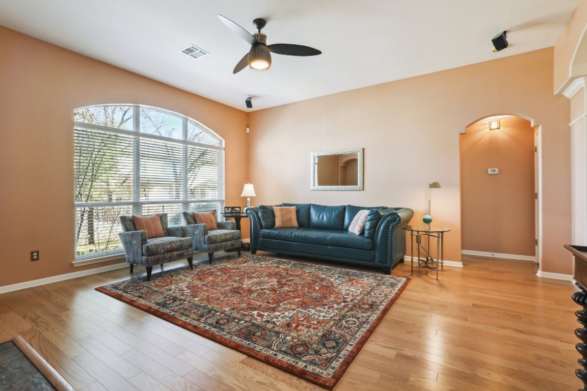 3805 Pebble Court Round Rock, TX 78664 - Photo 19 of 31 a living room with furniture and a rug