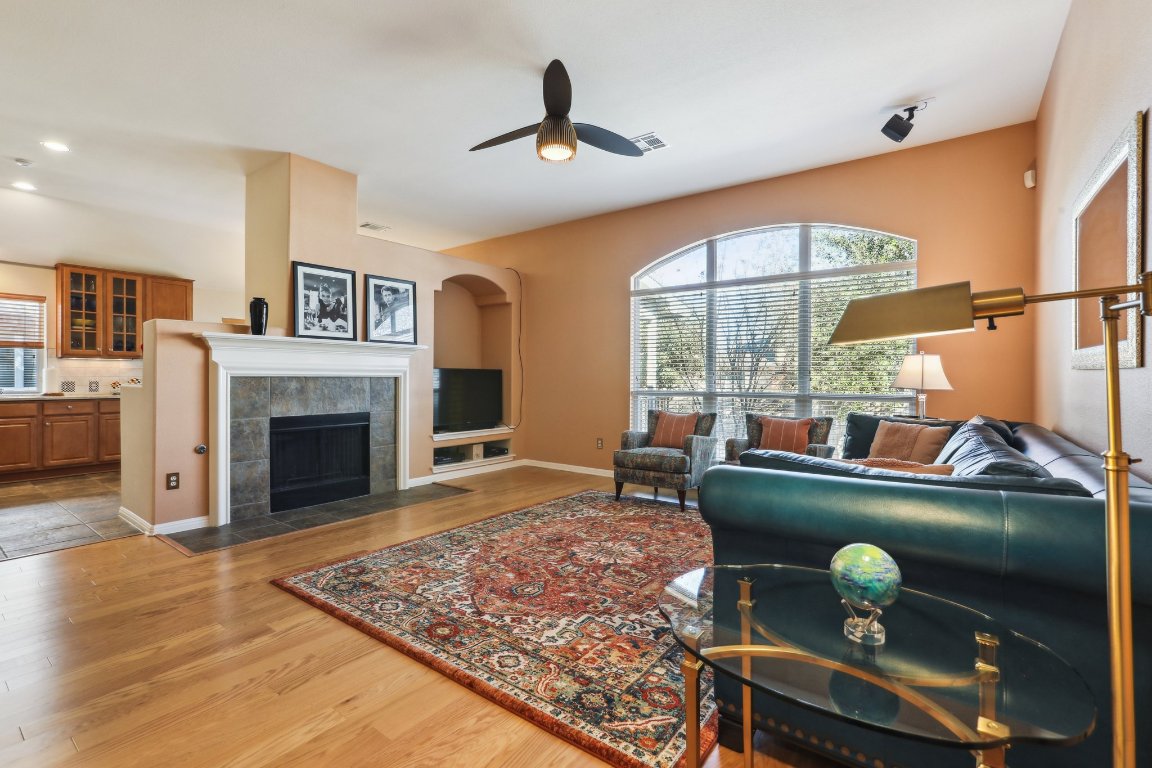 3805 Pebble Court Round Rock, TX 78664 - Photo 21 of 31 a living room with furniture and a fireplace