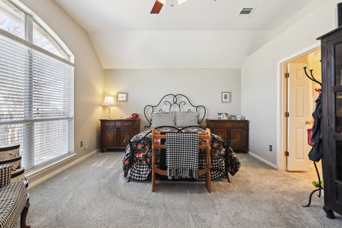 3805 Pebble Court Round Rock, TX 78664 - Photo 22 of 31 a bedroom with a bed and a window