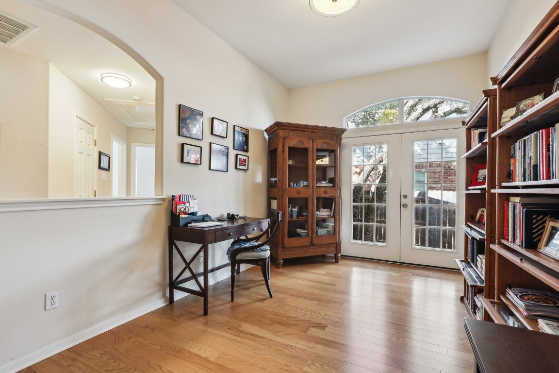 3805 Pebble Court Round Rock, TX 78664 - Photo 5 of 31 a view of a livingroom with furniture and book shelf